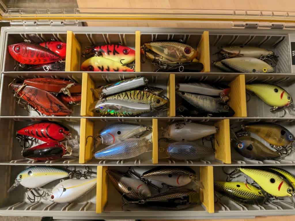 A variety of lipless and squarebill crankbaits neatly organized in a 3700 Plano Edge box, showcasing efficient and protective storage for bass fishing lures.