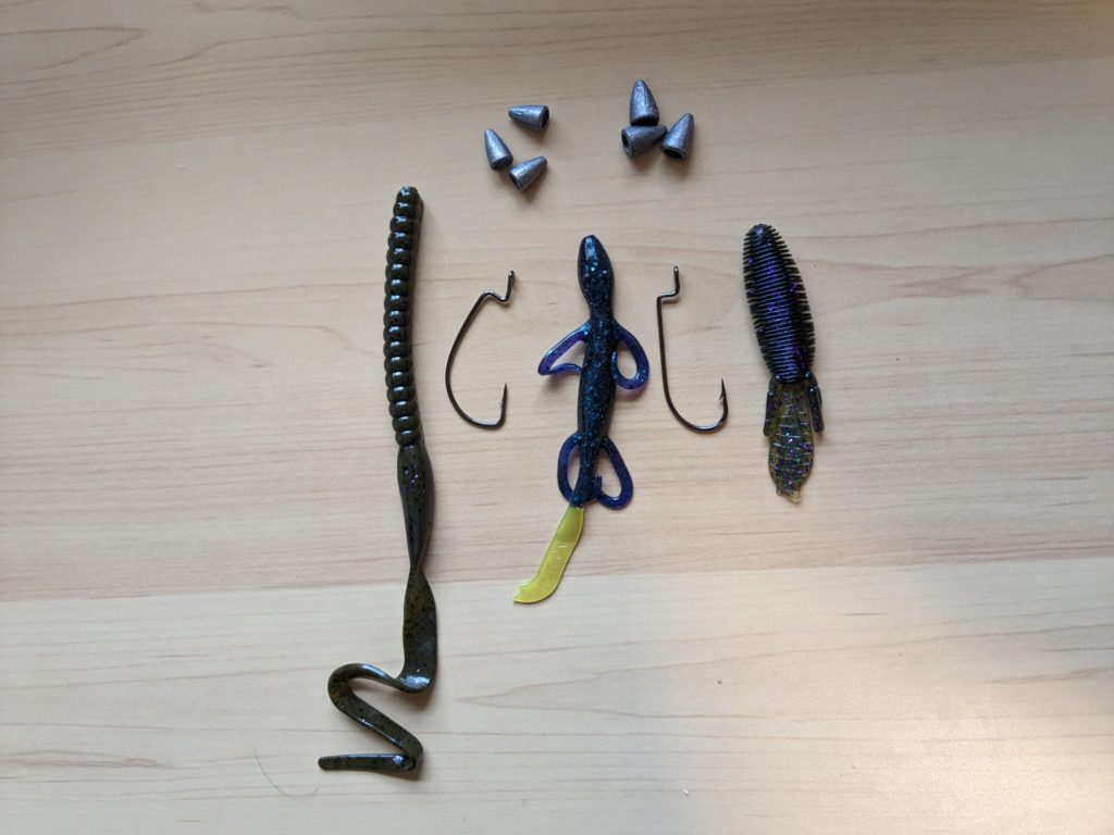 Assorted Soft Plastics, EWG Hooks, Offset Worm Hooks, and Bullet Weights for Texas Rigging Bass Fishing