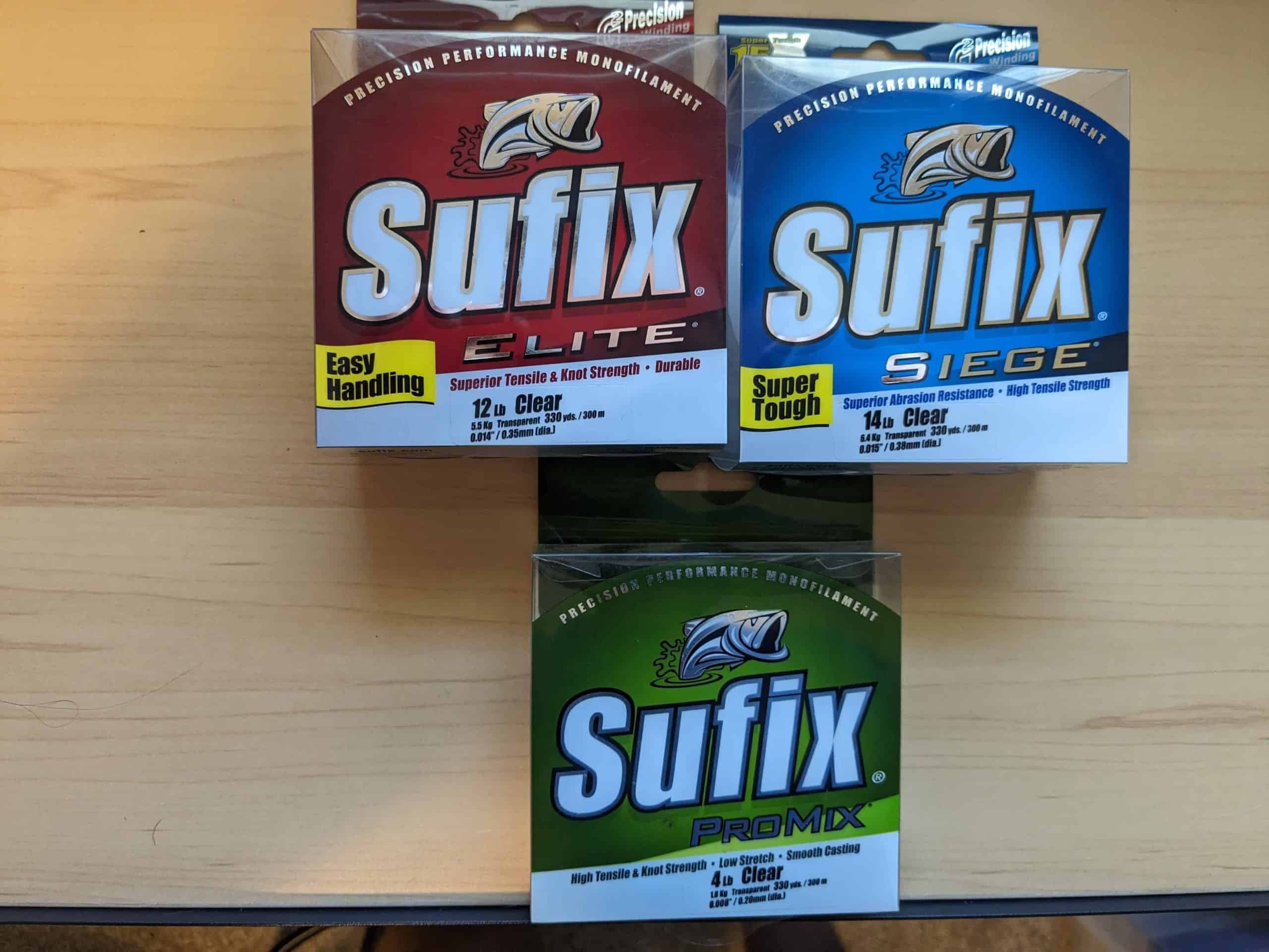 Assortment of Sufix fishing lines, including Sufix Advanced Monofilament, Sufix Invisiline Fluorocarbon, and Sufix 832 Advanced Superline