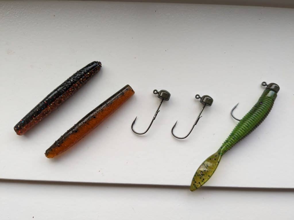 Assortment of Z-Man Ned Rig jig heads and baits including the Finesse TRD and Hula StickZ, ideal for a range of fishing conditions.