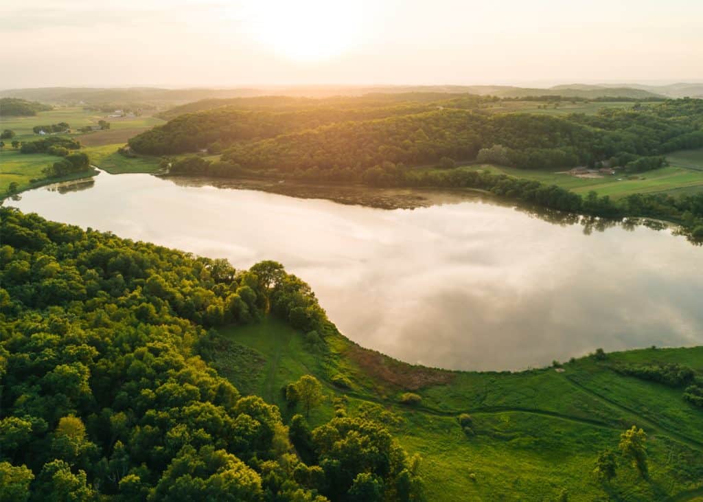 Scenic lake view where bass anglers gather with friends for a day of fishing.