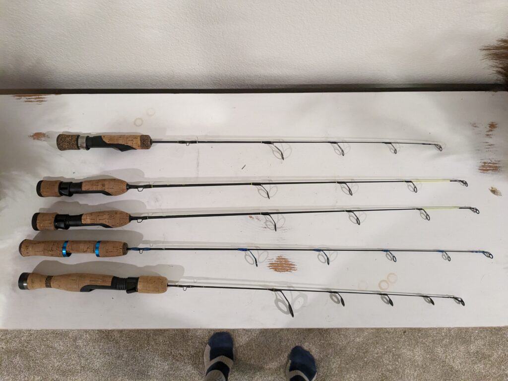 A variety of ice fishing rods that are used to catch largemouth bass through the ice. 